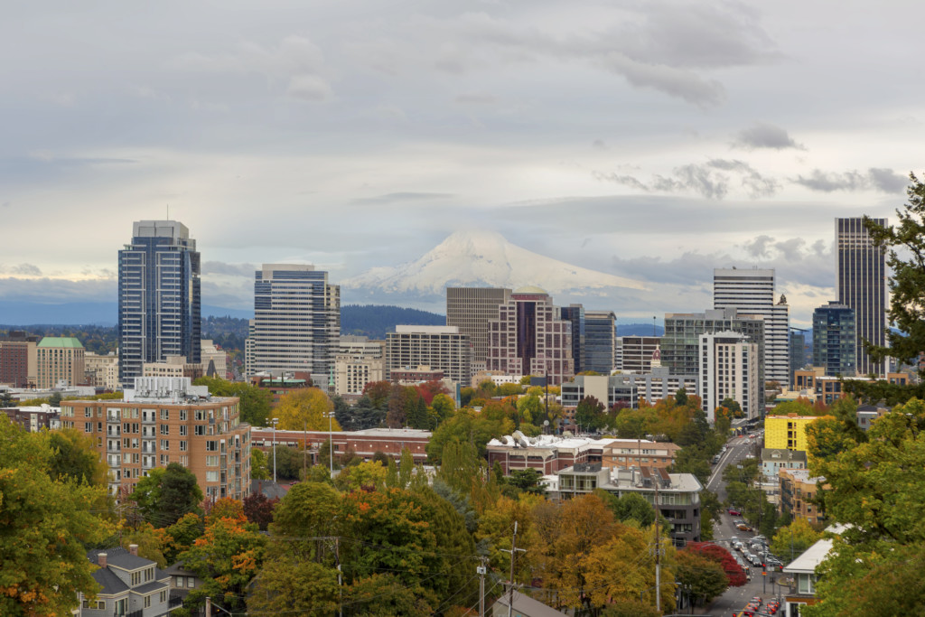 Portland Oregon downtown city skyline and snow covered Mount Hood view in Fall Season America