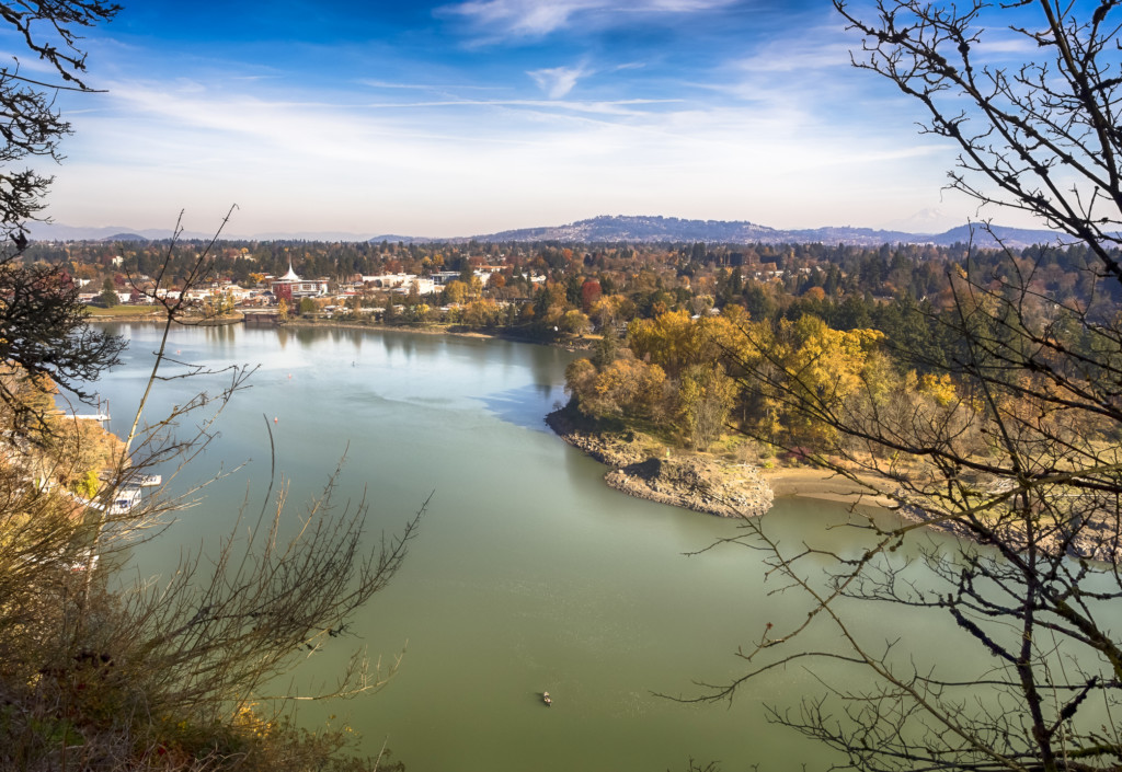Willamette river in sunny autumn day. View from above. Milwaukie City, Oregon, on the background