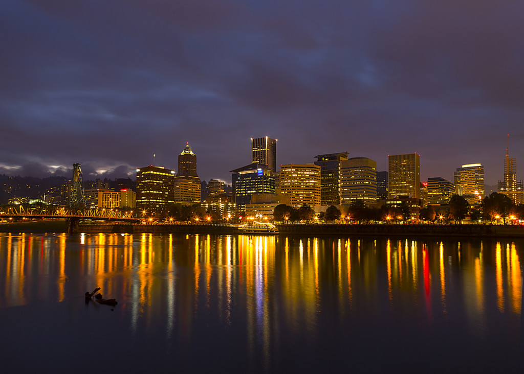 Beautiful view of Portland downtown opens from the bank of Willamette river.